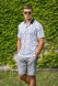 White polo shirt with a bold pattern
